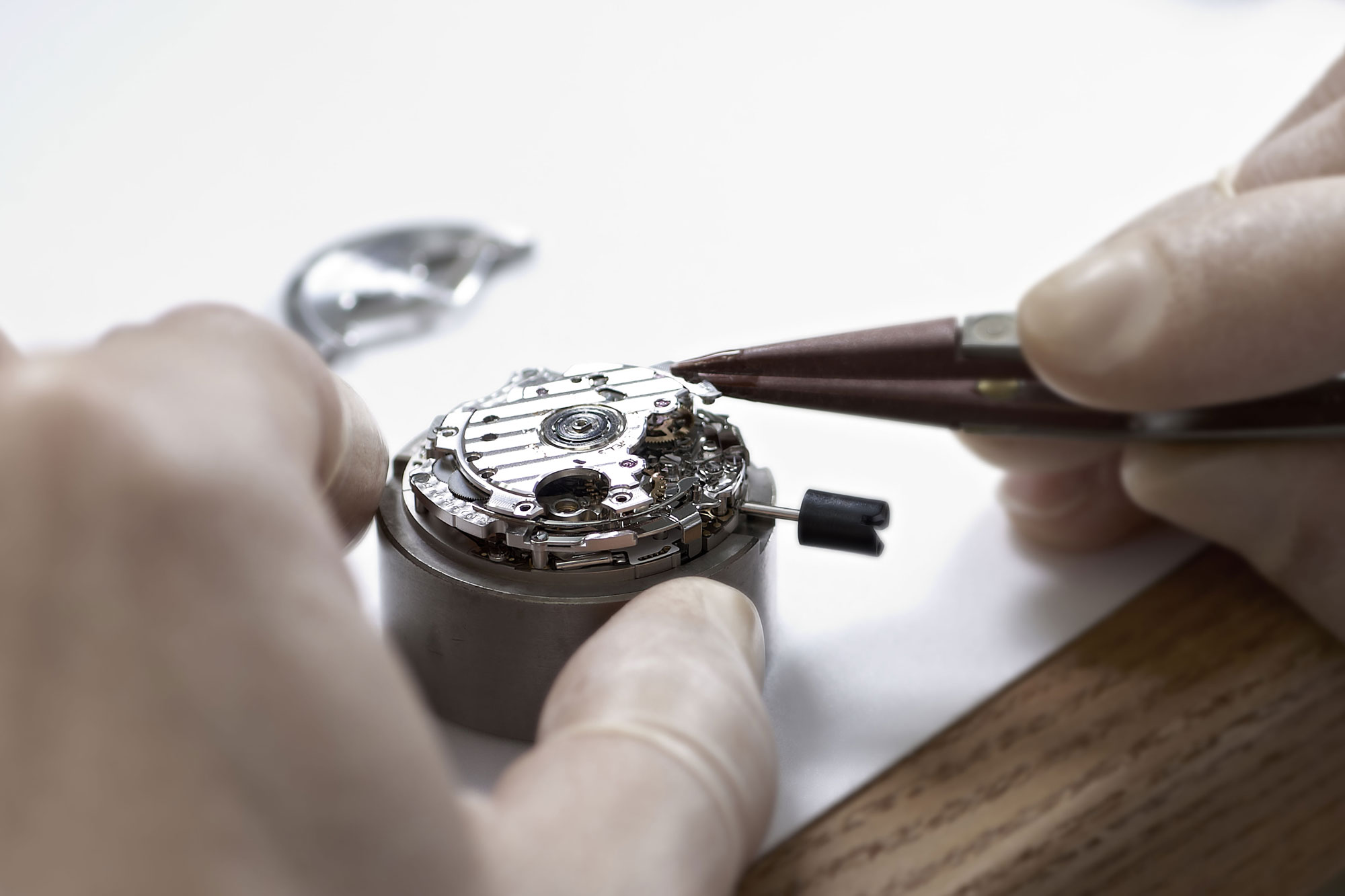 Close up of watchmaker assembling Grand Seiko caliber 9R86.