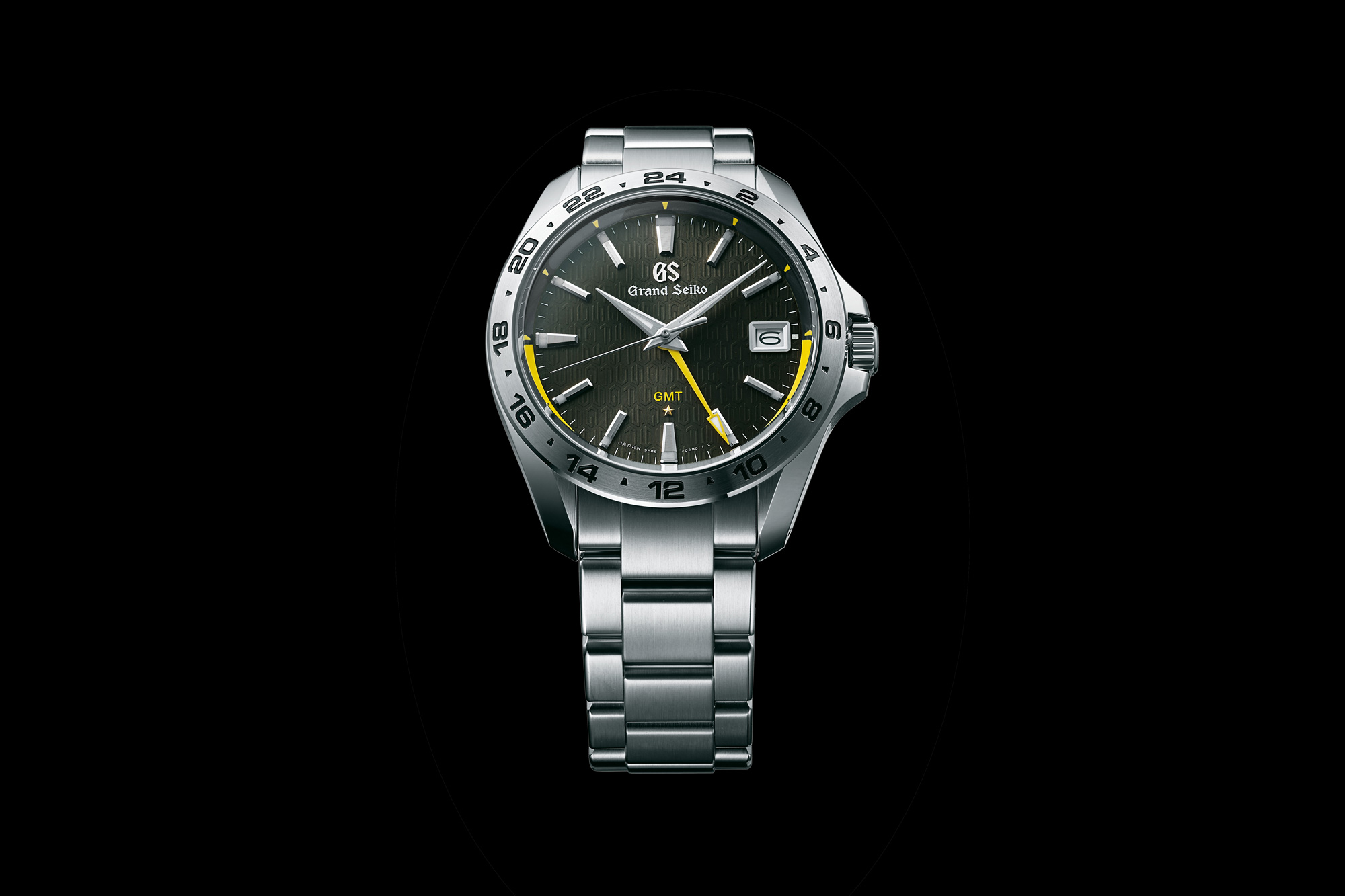 Grand Seiko SBGN001, stainless steel wristwatch with yellow accents.