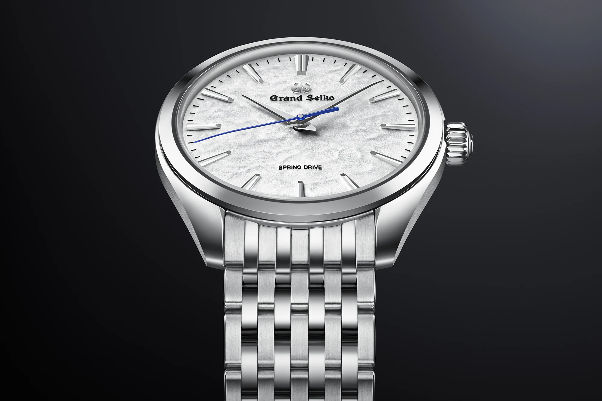 Grand Seiko SBGY013 white dial watch on bracelet..